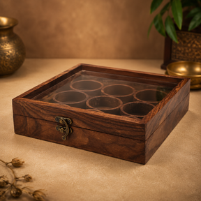 Square wooden spice box made from sheesham wood with a transparent glass lid and detachable round containers
